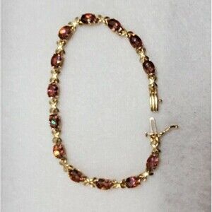 Mystic Twilight Topaz bracelet 14kt yellow gold 7x5mm oval